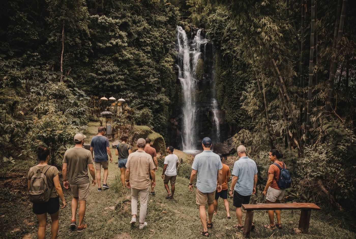 A team walking down to the first waterfall below Desa Eko
